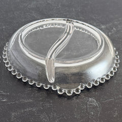 Clear Imperial Candlewick divided glass dishes with beaded rims and side handles, shown from multiple angles to display shape and condition.