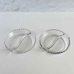 Clear Imperial Candlewick divided glass dishes with beaded rims and side handles, shown from multiple angles to display shape and condition.