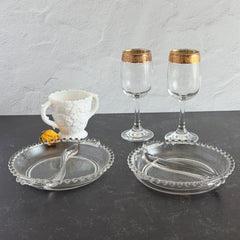 Clear Imperial Candlewick divided glass dishes with beaded rims and side handles, shown from multiple angles to display shape and condition.