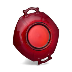 Vintage Imperial Glass Ruby Red Molly serving dish with hexagonal shape, twin handles, and low footed base, shown in various lighting to highlight its translucent red pressed glass and geometric design.