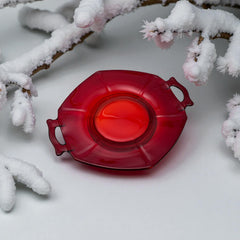Vintage Imperial Glass Ruby Red Molly serving dish with hexagonal shape, twin handles, and low footed base, shown in various lighting to highlight its translucent red pressed glass and geometric design.