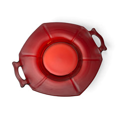 Vintage Imperial Glass Ruby Red Molly serving dish with hexagonal shape, twin handles, and low footed base, shown in various lighting to highlight its translucent red pressed glass and geometric design.