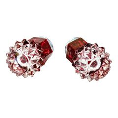 Pair of vintage Indiana Glass salt and pepper shakers featuring clear diamond point bases, paneled ruby red flash bands, and chrome-plated screw-on lids marked Made in Hong Kong. Mid-century design in excellent vintage condition.