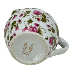 Vintage 1950s Japan porcelain creamer with pink chintz floral pattern, green leaves, and gold trim on rim and handle, marked Made in Japan