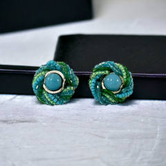 Vintage 1950s Japan clip-on earrings with turquoise bead center, green and turquoise seed beads, and silver tone ring.