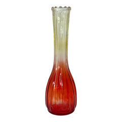 Vintage Jeannette Glass vase with ombre Amberina coloring and fluted design, styled with complementary flowers and soft lighting to highlight its texture, color gradient, and collectible charm.