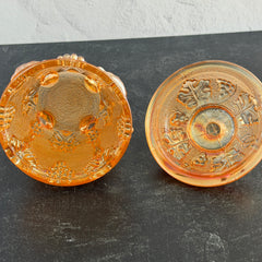 Vintage Jeannette marigold carnival glass candy dish with grape and leaf pattern, iridescent finish, and footed base