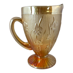 Vintage Jeannette marigold carnival glass pitcher with irises and herringbone pattern, ideal for sustainable home decor or serving drinks in eco-conscious style.