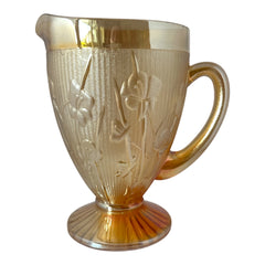 Vintage Jeannette marigold carnival glass pitcher with irises and herringbone pattern, ideal for sustainable home decor or serving drinks in eco-conscious style.