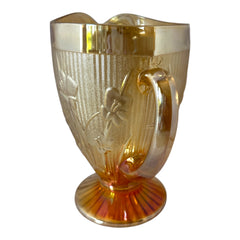 Vintage Jeannette marigold carnival glass pitcher with irises and herringbone pattern, ideal for sustainable home decor or serving drinks in eco-conscious style.