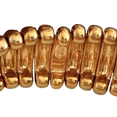 Vintage Joan Rivers gold‑tone link bracelet with rounded segments and elastic stretch design, shown from various angles to display details and condition.