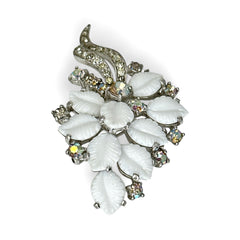 Vintage Jomaz floral spray brooch with molded milk glass leaves and aurora borealis rhinestones in silver tone setting, signed on reverse—1950s mid-century costume jewelry in excellent condition.