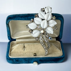 Vintage Jomaz floral spray brooch with molded milk glass leaves and aurora borealis rhinestones in silver tone setting, signed on reverse—1950s mid-century costume jewelry in excellent condition.