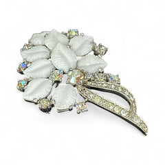 Vintage Jomaz floral spray brooch with molded milk glass leaves and aurora borealis rhinestones in silver tone setting, signed on reverse—1950s mid-century costume jewelry in excellent condition.