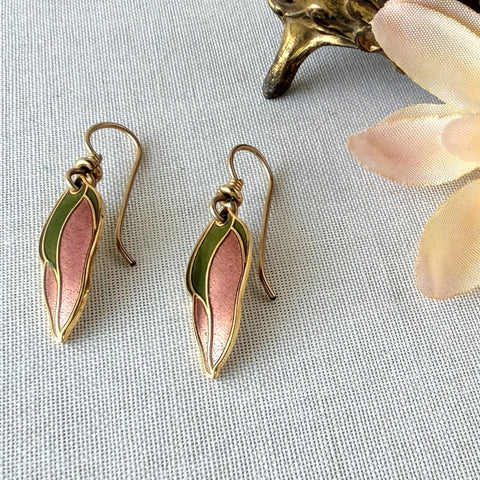Vintage Laurel Burch “Barbee’s Blossom” earrings with pink and green enamel petal-shaped design and gold‑tone hooks.
