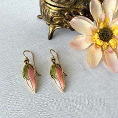 Vintage Laurel Burch “Barbee’s Blossom” earrings with pink and green enamel petal-shaped design and gold‑tone hooks.