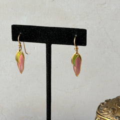 Vintage Laurel Burch “Barbee’s Blossom” earrings with pink and green enamel petal-shaped design and gold‑tone hooks.