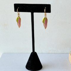 Vintage Laurel Burch “Barbee’s Blossom” earrings with pink and green enamel petal-shaped design and gold‑tone hooks.