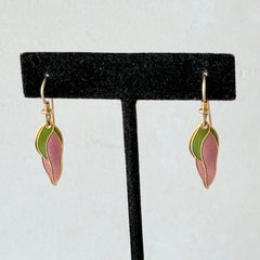Vintage Laurel Burch “Barbee’s Blossom” earrings with pink and green enamel petal-shaped design and gold‑tone hooks.