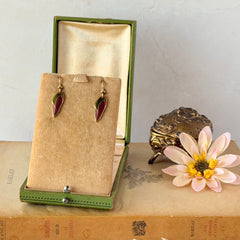 Vintage Laurel Burch “Barbee’s Blossom” earrings with pink and green enamel petal-shaped design and gold‑tone hooks.
