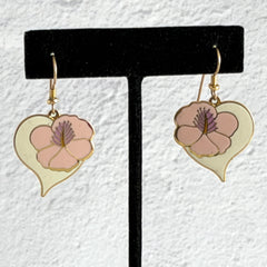 Vintage Laurel Burch Hibiscus Heart earrings with pink and white enamel flowers on gold‑tone heart dangles.