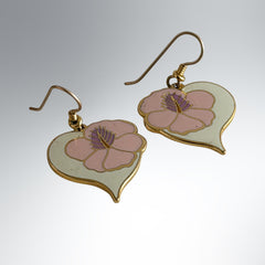 Vintage Laurel Burch Hibiscus Heart earrings with pink and white enamel flowers on gold‑tone heart dangles.