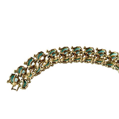 Vintage Leru light blue thermoset Lucite shell bracelet with gold‑tone links and blue rhinestones, signed Leru ©.