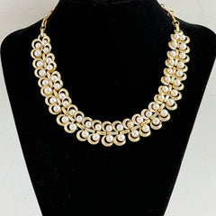 Vintage Lisner necklace with faux pearls and gold‑tone links, shown from various angles to display its mid‑century design, adjustable length, and signed clasp.