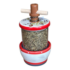 Vintage Provence herb mill with hand-painted olive branch motif in green and black on a cream ceramic base, featuring a ridged interior and terracotta accents.