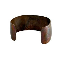 Vintage Southwestern copper and brass cuff bracelet with abalone wolf motif and natural patina, shown from multiple angles.