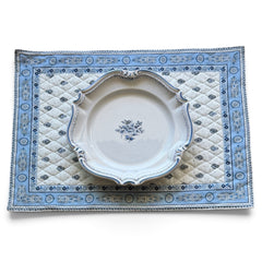 Quilted cotton placemat in light blue and white with Provençal floral and paisley motifs, handcrafted in France by Tissus Toselli.