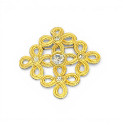 Vintage matte gold tone brooch with textured open loops and clear rhinestones, shown from different angles to highlight its square or diamond shape and detailed craftsmanship