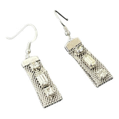 Vintage clear rhinestone and silver tone mesh dangle earrings with emerald-cut rhinestones and chaton accents, paired with sterling silver ear wires, photographed against a clean, neutral backdrop.