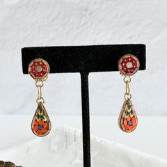 Vintage Italian micro mosaic dangle clip‑on earrings with red, orange, green, and white floral glass tesserae set in gold‑tone metal.