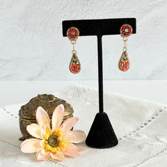 Vintage Italian micro mosaic dangle clip‑on earrings with red, orange, green, and white floral glass tesserae set in gold‑tone metal.