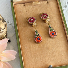 Vintage Italian micro mosaic dangle clip‑on earrings with red, orange, green, and white floral glass tesserae set in gold‑tone metal.