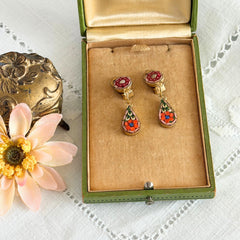 Vintage Italian micro mosaic dangle clip‑on earrings with red, orange, green, and white floral glass tesserae set in gold‑tone metal.
