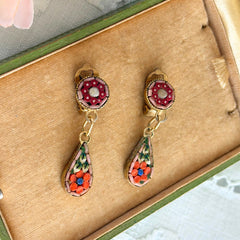 Vintage Italian micro mosaic dangle clip‑on earrings with red, orange, green, and white floral glass tesserae set in gold‑tone metal.