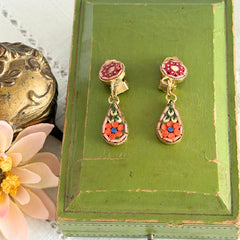 Vintage Italian micro mosaic dangle clip‑on earrings with red, orange, green, and white floral glass tesserae set in gold‑tone metal.