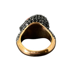 Vintage Honora Italy bronze ring featuring a 12.5mm orange cultured pearl surrounded by faceted black spinel; warm-toned statement jewelry with autumnal elegance and sculptural detail.