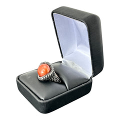 Vintage Honora Italy bronze ring featuring a 12.5mm orange cultured pearl surrounded by faceted black spinel; warm-toned statement jewelry with autumnal elegance and sculptural detail.