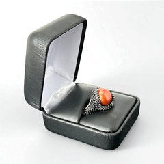 Vintage Honora Italy bronze ring featuring a 12.5mm orange cultured pearl surrounded by faceted black spinel; warm-toned statement jewelry with autumnal elegance and sculptural detail.