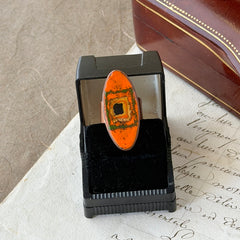 Vintage Brazilian copper ring with orange, green, and gold enamel geometric oval design, adjustable band, signed Artesanato Moida Bitter Belo Horizonte Brazil.