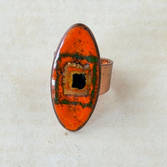 Vintage Brazilian copper ring with orange, green, and gold enamel geometric oval design, adjustable band, signed Artesanato Moida Bitter Belo Horizonte Brazil.