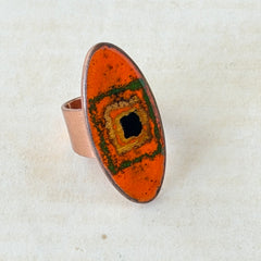 Vintage Brazilian copper ring with orange, green, and gold enamel geometric oval design, adjustable band, signed Artesanato Moida Bitter Belo Horizonte Brazil.