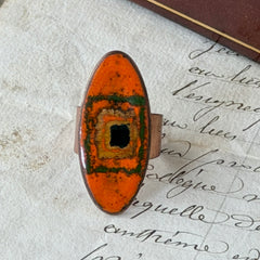 Vintage Brazilian copper ring with orange, green, and gold enamel geometric oval design, adjustable band, signed Artesanato Moida Bitter Belo Horizonte Brazil.