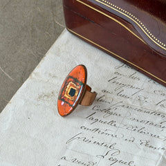 Vintage Brazilian copper ring with orange, green, and gold enamel geometric oval design, adjustable band, signed Artesanato Moida Bitter Belo Horizonte Brazil.