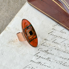 Vintage Brazilian copper ring with orange, green, and gold enamel geometric oval design, adjustable band, signed Artesanato Moida Bitter Belo Horizonte Brazil.