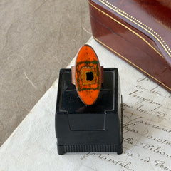 Vintage Brazilian copper ring with orange, green, and gold enamel geometric oval design, adjustable band, signed Artesanato Moida Bitter Belo Horizonte Brazil.