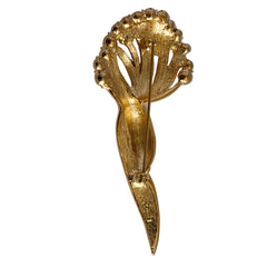 Vintage Monet gold tone brooch with pave rhinestones in a stylized floral umbel design.